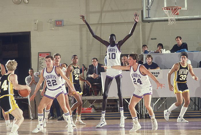In professional basketball, Manute Bol stood at 7'7" (2.43 meters) tall and has a "wingspan" (arms outstretched) of 8'6" (2.62 meters).