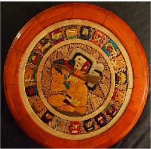 This is a hand-carved Mayan calendar, which is similar, but differs from the Aztec calendar.