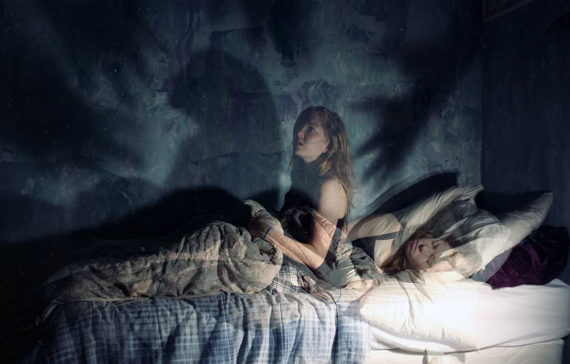 The classic definition for this phenomenon is called sleep paralysis. It may last a few seconds, several moments, or occasionally longer and usually occurs right before you are about to fall asleep or wake up. Many people report feeling a “presence” that is often described as malevolent, threatening or, evil, and usually experience a tremendous amount of terror.
