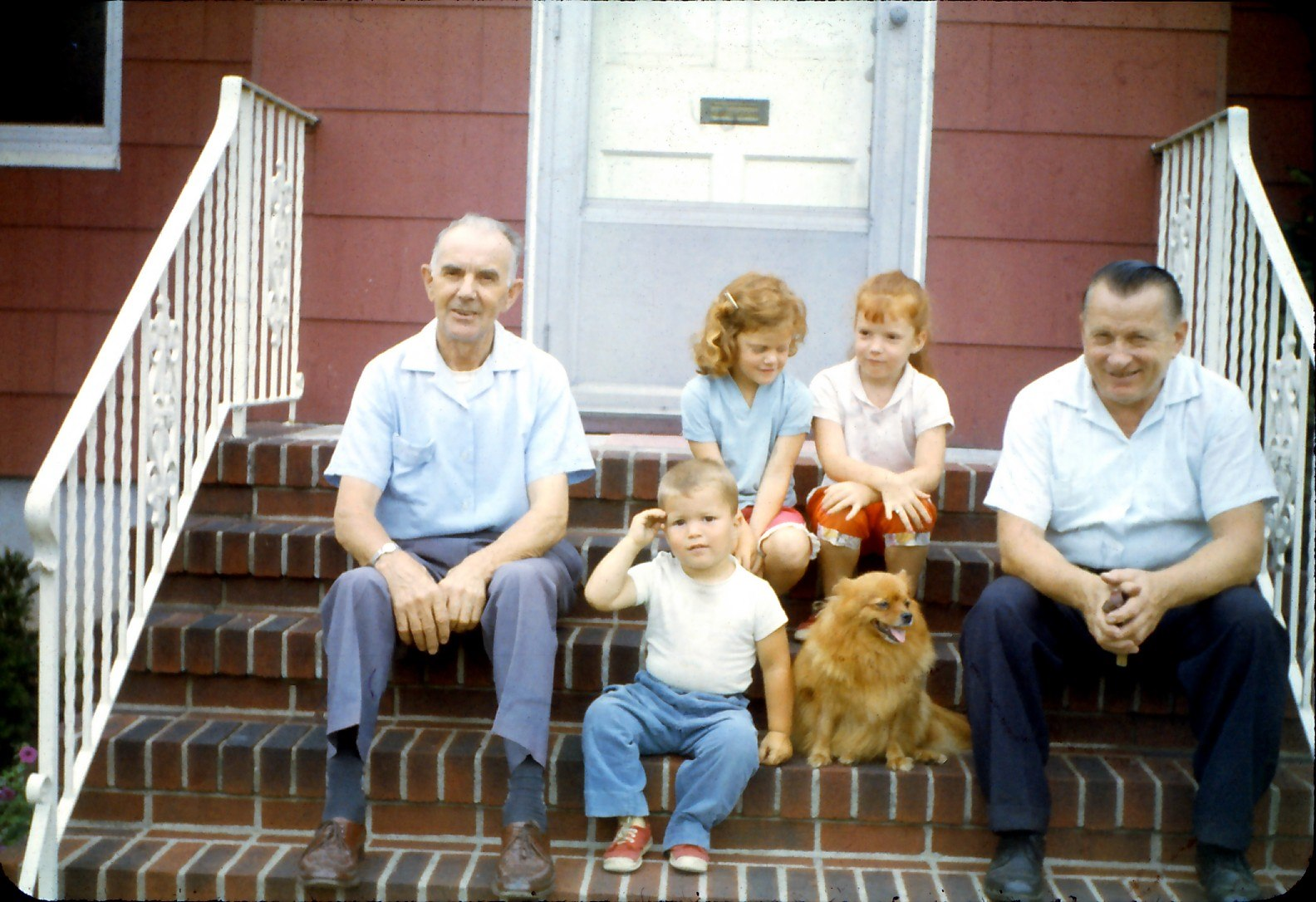 I must be doing something right. I found a picture of my sisters and me when we were kids, sitting on my grandfather's front porch with both of my grandfathers. At the time, they were both around 60 years old.