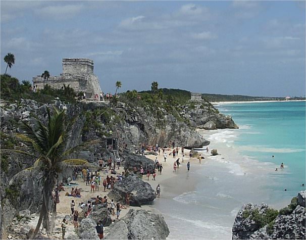 I'm standing on top of the cliff facing Tulum. Tulum hosts the 2nd largest coral barrier in the world, which served to protect Tulum from possible invaders by water.