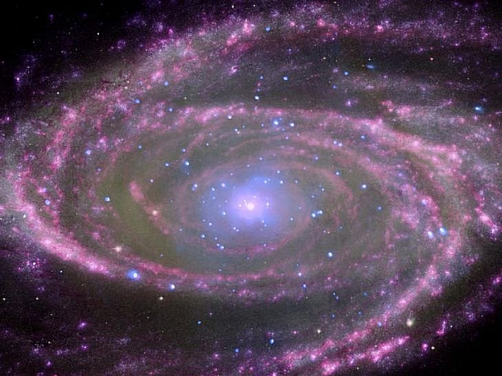 At the center of spiral galaxy M81 is a supermassive black hole about 70 million times more massive than our sun.